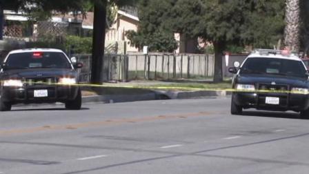Patrol cars are parked at the scene of a double shooting in San Bernardino on Tuesday, July 10, 2012.