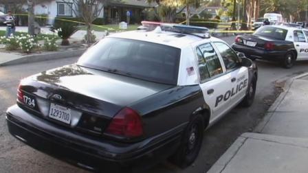 Ontario police patrol cars are parked at the scene of a shooting on Sunday, July 22, 2012.