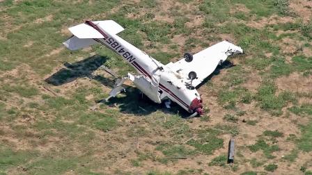 A plane is seen after it crashed in Chino on Friday, August 10, 2012. One person was injured in the crash.