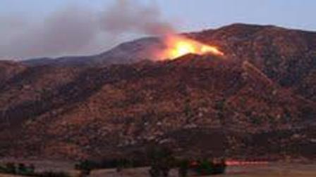 A brush fire is seen burning in Banning on Saturday, Sept. 29, 2012.