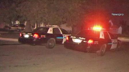 Patrol cars appear near the scene of a domestic violence incident on the 1300 block of North Pampas Avenue in Rialto on Sunday, Oct. 7, 2012.