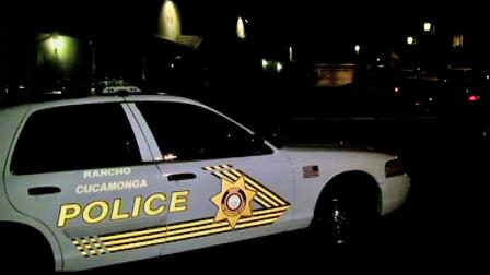 A Rancho Cucamonga police vehicle is parked outside the scene of a fatal stabbing on Tuesday, Nov. 20, 2012.