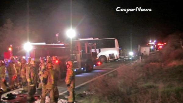 Rescue crews work at the scene of a deadly tour bus crash on State Route 38 north of Yucaipa on Sunday, Feb. 3, 2013. Several people were killed and at least 15 others were left in critical condition.