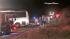Rescue crews work at the scene of a deadly tour...