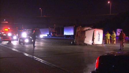 A big rig rolled over on its side on the eastbound 10 Freeway at the 215 Freeway Tuesday, Feb. 5, 2013.
