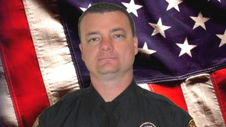 Riverside Police Officer Mike Crain is pictured in this undated file photo provided by the Riverside Police Department. Crain was killed in an ambush while on routine patrol on Thursday, Feb. 7, 2013.