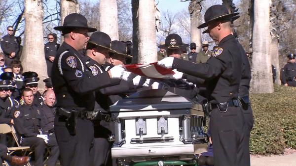 Riverside Officer Michael Crain is laid to rest at Riverside National Cemetery on Wednesday, Feb. 13, 2013.
