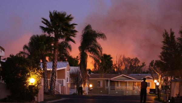 ABC7 viewer Scott Hall sent us this photo of a brush fire burning near homes in Jurupa Valley on Thursday, Feb. 28, 2013.