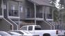 The apartment where a father was taken into custody for child abuse is seen on Wednesday, March 20, 2013.