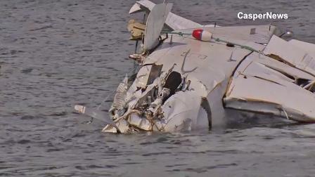 A single-engine Beechcraft is seen after it crashed in Big Bear Lake while trying to make an emergency landing on Saturday, April 6, 2013. The five passengers inside the plane were not hurt.