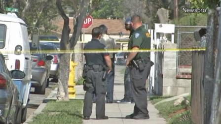 Law enforcement officials are shown at the scene of a fatal shooting on the 700 block of 11th Street in San Bernardino on Saturday, April 27, 2013.