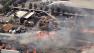 An explosion that ripped through a pallet yard in Fontana on Saturday, May 4, 2013, trigged a massive fire, sending plumes of smoke into the air that could be seen for miles.
