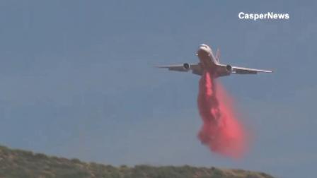 An aircraft drops fire retardant over the Gorgonio Fire south of Banning on Saturday, May 4, 2013.