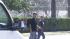 Two people jaywalk outside of North High School in Riverside Thursday, May 23, 2013.