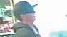 Surveillance images show a suspect wanted in an armed robbery at a Hemet liquor store on Tuesday, May 21, 2013.