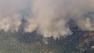 The brush fire in Riverside County burns on Thursday, July 18, 2013.