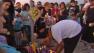 Family and friends gather for a vigil for 26-year-old Daniel Raul Olivera, whi was gunned down outside AM/PM in Victorvilleon Sunday, Aug. 11, 2013.