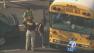 Students are escorted onto a bus during a school lockdown in the San Gabriel Valley in September 2013.