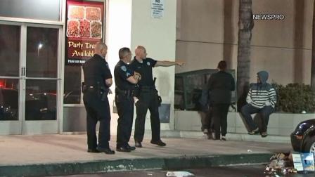 Police investigate a shooting outside the El Super Market on the 1500 block of West Baseline Street in San Bernardino on Friday, Oct. 25, 2013.