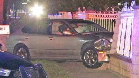 A man in a car, seen crashed into a fence in the 1000 block of North Willow Avenue in Rialto, was shot and killed on Friday, Nov. 8, 2013.