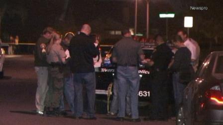 Police investigate a shooting at a home in the 8400 block of Sunshine Lane on Monday, Nov. 11, 2013.