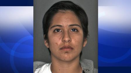 Valerie Segura, 20, is seen in a booking photo from the Chino Police Department. Segura, a basketball coach at Don Lugo High School, was arrested and booked for sending/receiving child pornography and annoying or molesting a child.