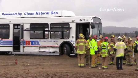 Emergency personnel surround the scene of a bus crash on Highway 74 in the Homeland area of Riverside County Thursday, Dec. 19, 2013.