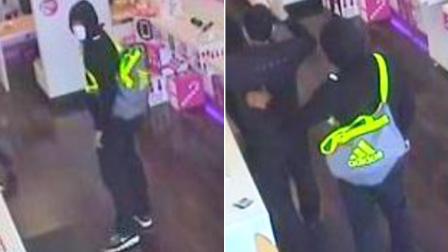 Surveillance still images show a suspect wanted for robbing a T-Mobile store in Upland on Friday, Dec. 27, 2013.