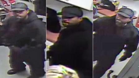 Surveillance images were released of a suspect who robbed a phone store in Highland in December.