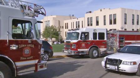 Fire engines are parked outside Loma Linda University following a gas main rupture on Tuesday, Jan. 21, 2014.