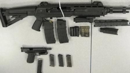 The San Bernardino County Sheriffs Department released this photo of weapons recovered during an investigation into a deputy being shot at by a suspect in Victorville on Sunday, Feb. 2, 2014.
