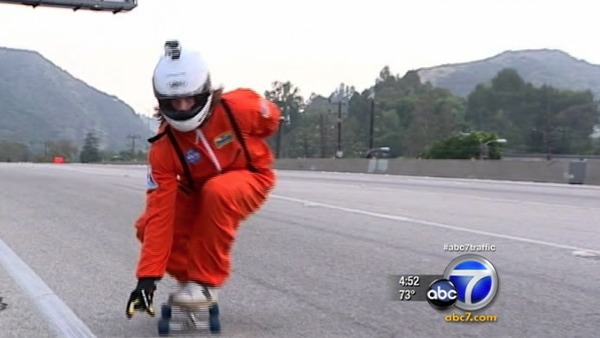 Skateboarder rides down closed 405 Freeway