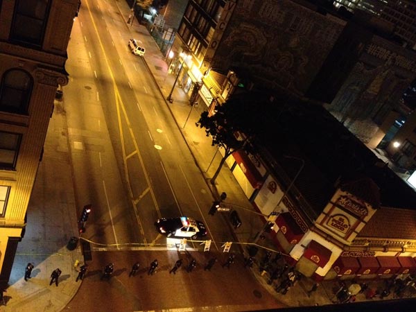 LAPD officers in riot gear block off North...