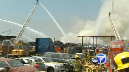 After working on a Wilmington scrap yard fire since Saturday, firefighters say the fire will be out by Sunday sundown.