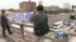 Activists waved banners protesting Arizonas...