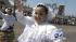 Dancers are seen on the parade route during the...