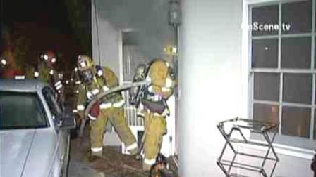A woman was found inside a fiery home in Studio City early Tuesday morning, authorities said.