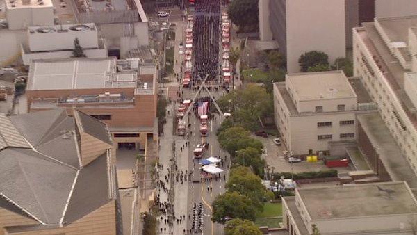 The funeral procession for fallen firefighter Glenn Allen is seen in downtown L.A. on Friday, Feb. 25, 2011.