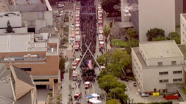The funeral procession for fallen firefighter Glenn Allen is seen in downtown L.A. on Friday, Feb. 25, 2011.