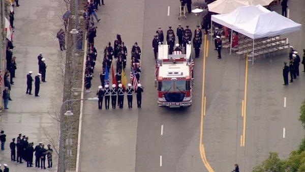 The funeral procession for fallen firefighter Glenn Allen is seen in downtown L.A. on Friday, Feb. 25, 2011.