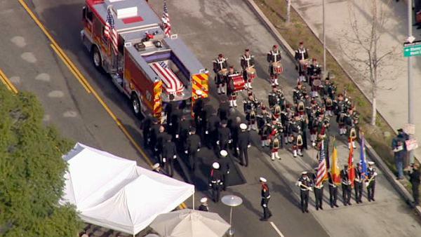 The funeral procession for fallen firefighter Glenn Allen is seen in downtown L.A. on Friday, Feb. 25, 2011.