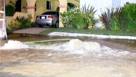 A broken water main sent gallons of water rushing into the street on Airdrome Street and Stanley Avenue in Mid City on Friday, May 20, 2011.