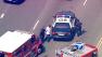 A police pursuit that wound its way through several cities ended with a crash and the arrest of a possible parolee.