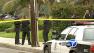 Police investigate the scene of the shooting deaths of two men at Penmar Park in Venice.