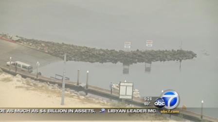 A swimming area in San Pedro Bay remained closed Friday because of contamination from a sewage spill.