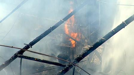 Authorities say a large 2-alarm fire broke out at a commercial building in Rosewood on Wednesday afternoon.