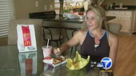 Emily Strunk, who will run in the Long Beach Marathon in October, is fueling up on fast food to help raise money for the Ronald McDonald house.