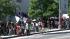 A large crowd assembles outside Los Angeles City...