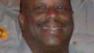 A man who went to help a stranded co-worker on a freeway Saturday night was hit and killed by a passing car.
