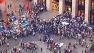 About 300 protesters assembled in downtown Los Angeles financial district Wednesday evening to march on Bank of America.